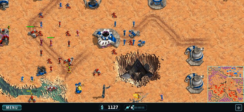 The game running on a phone held in landscape, with the full touch interface.